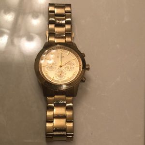 Woman’s Gold Guess watch